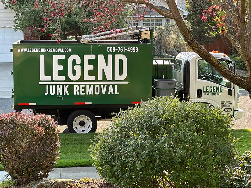 Legend Junk Removal truck at Spokane customer home